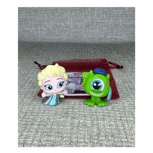 Mike Wazowski and Elsa Doorables